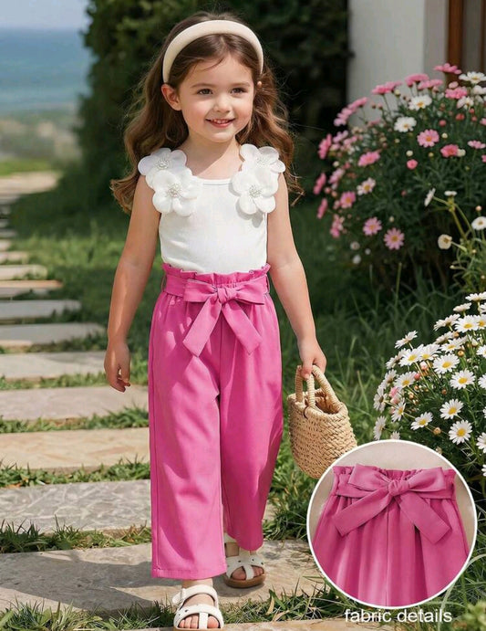 Blusa sin mangas con detalles en flores 3D + pantalón con cinturón