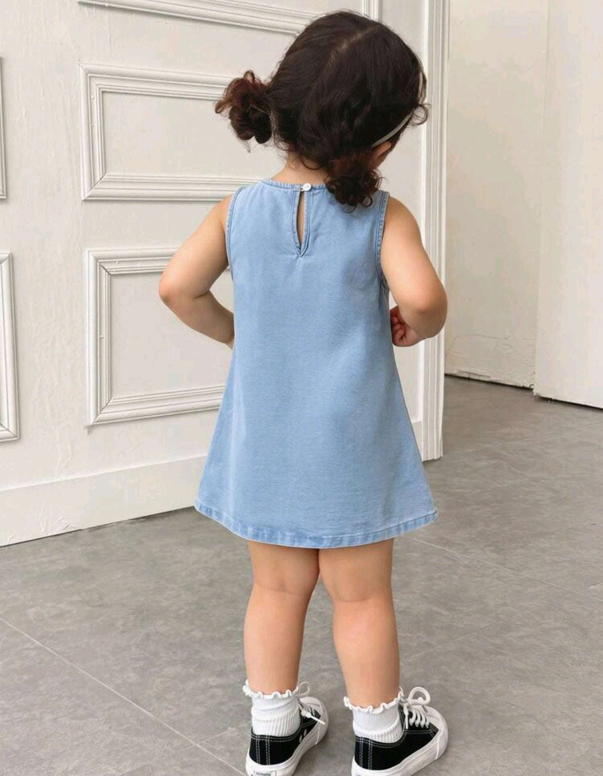 Vestido de Jeans sin mangas con detalles en moños
