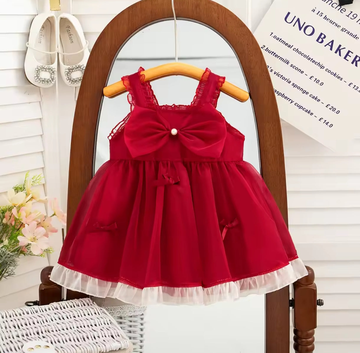 Vestido bebé con detalles en moños