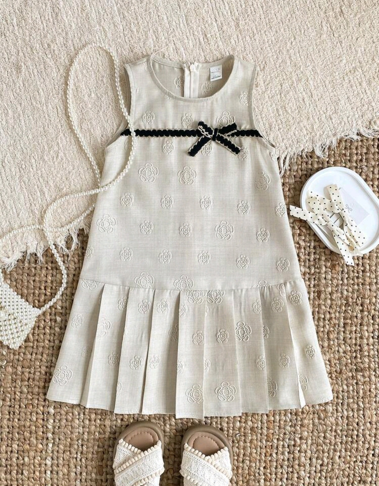 Vestido Suelto sin mangas con lazo y detalles en flores