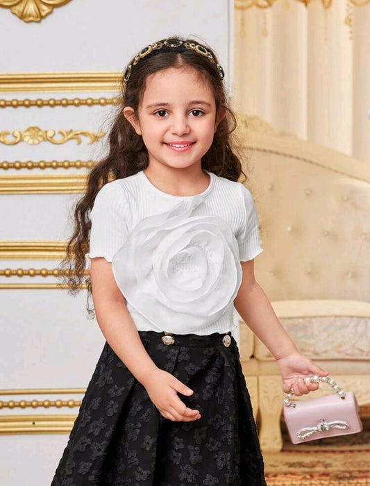 Blusa con detalles en flor 3D