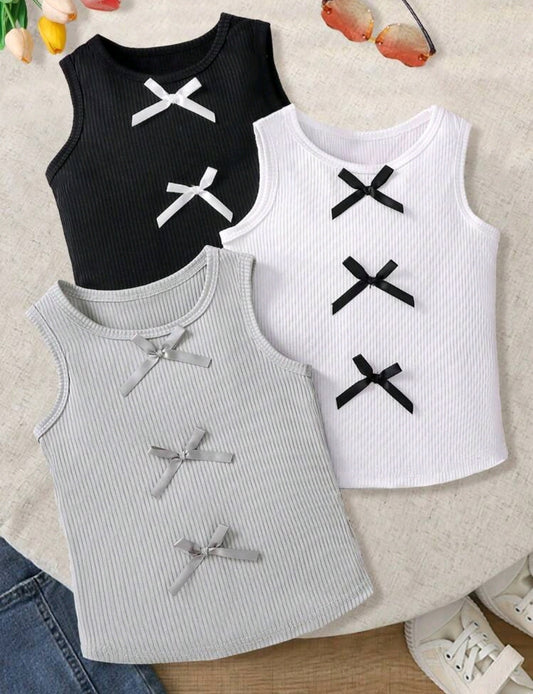 Blusita sin mangas con moños