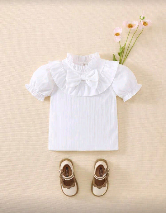 Blusa con cuello y detalles en moño