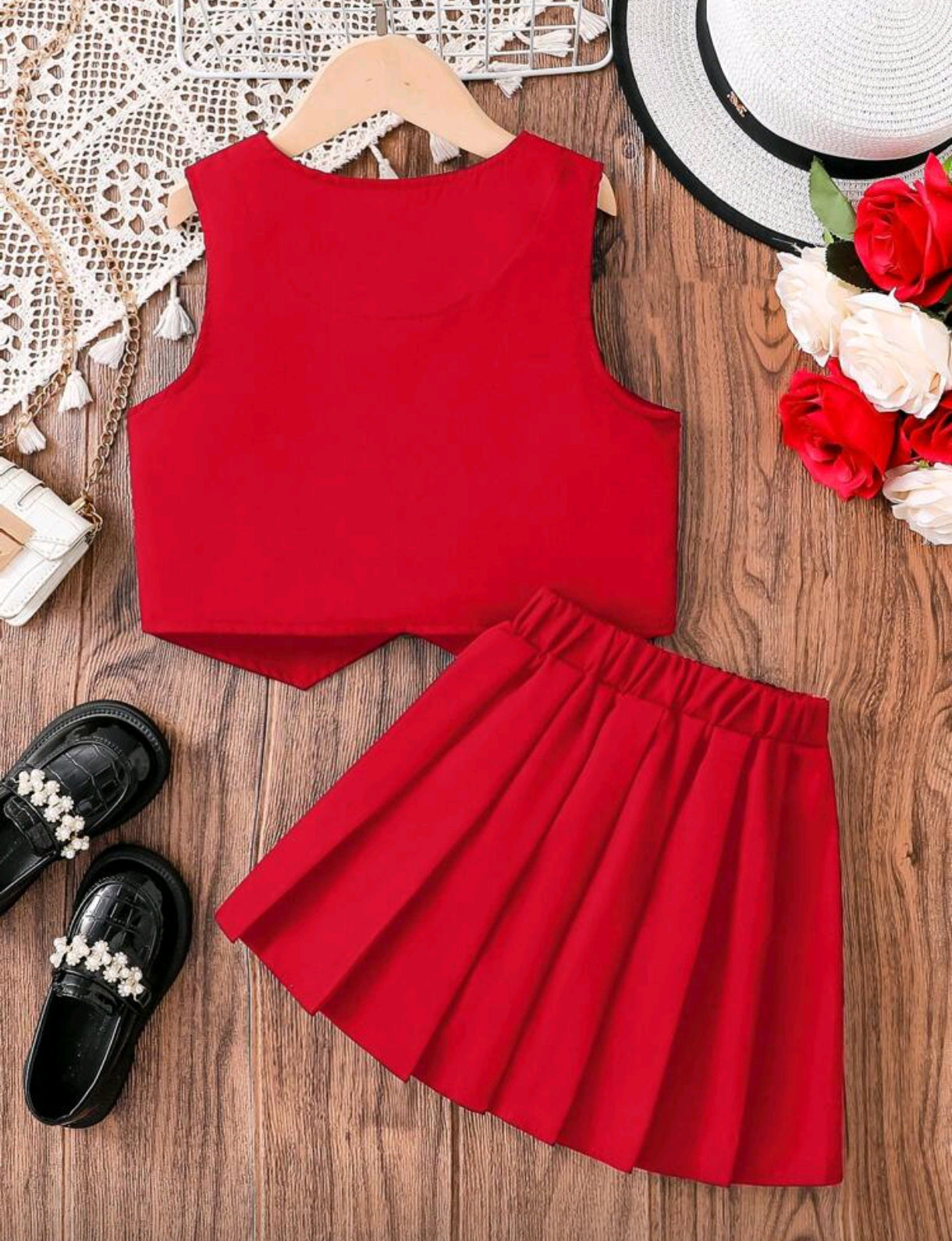 Chaleco+ falda plisada