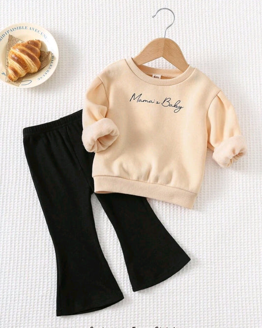 Mangas largas frizado con cuello redondo y moño + pantalón acampanado