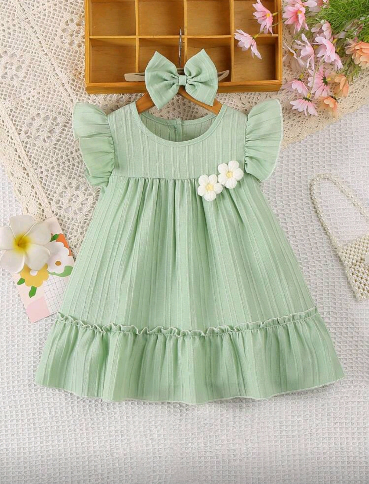 Vestido bebé con detalles en flor + diadema