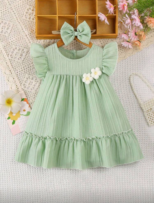 Vestido bebé con detalles en flor + diadema