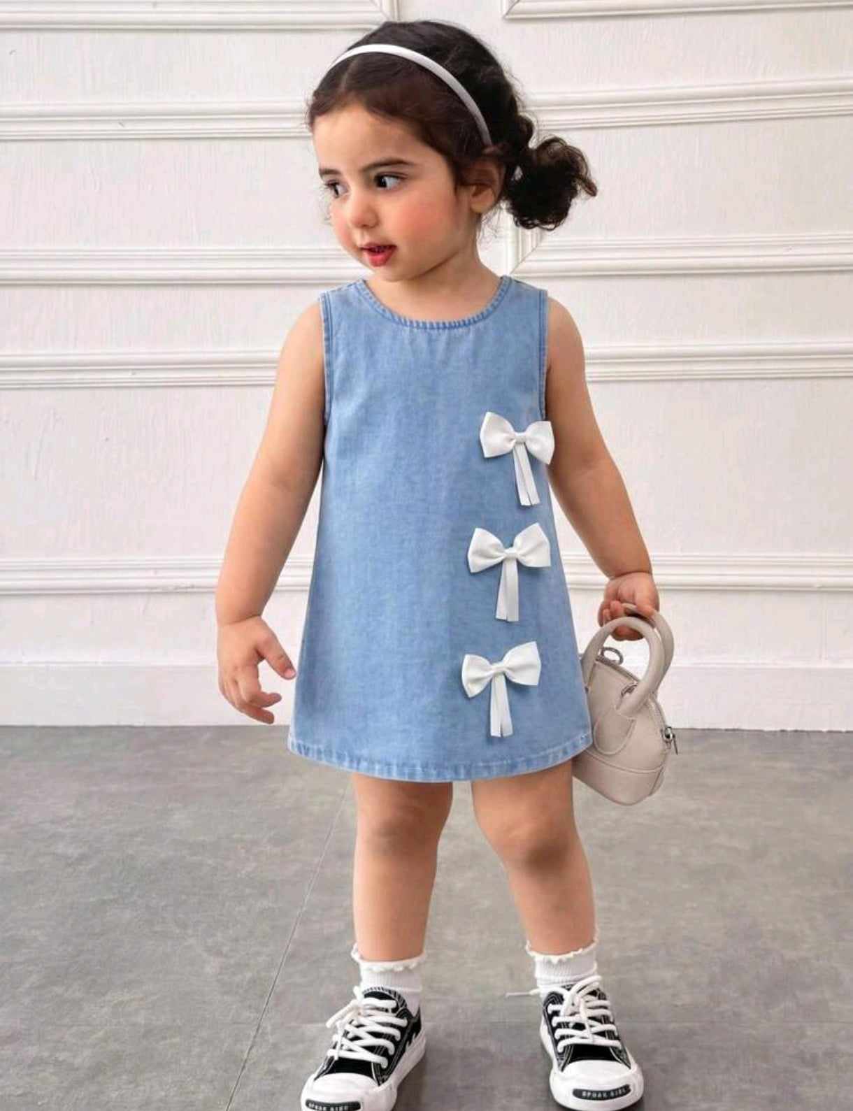 Vestido de Jeans sin mangas con detalles en moños