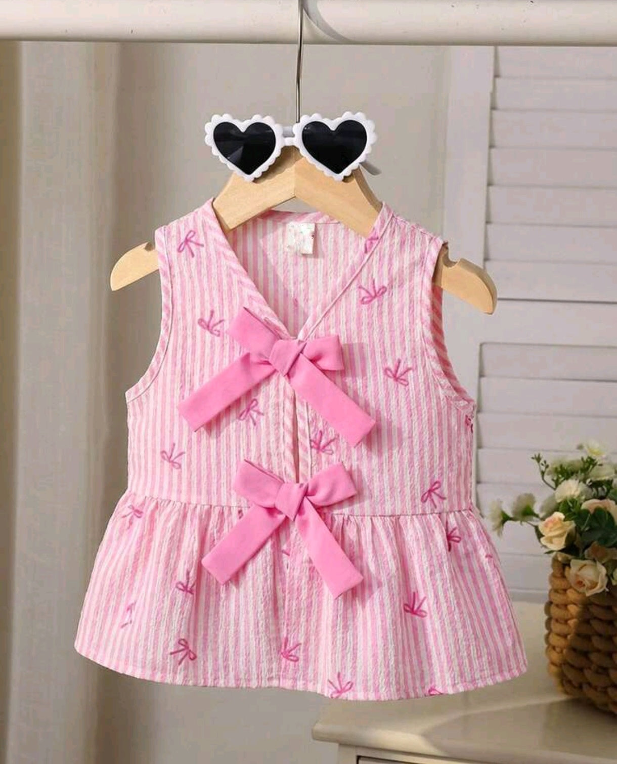 Blusa rosa cuello V con lazo