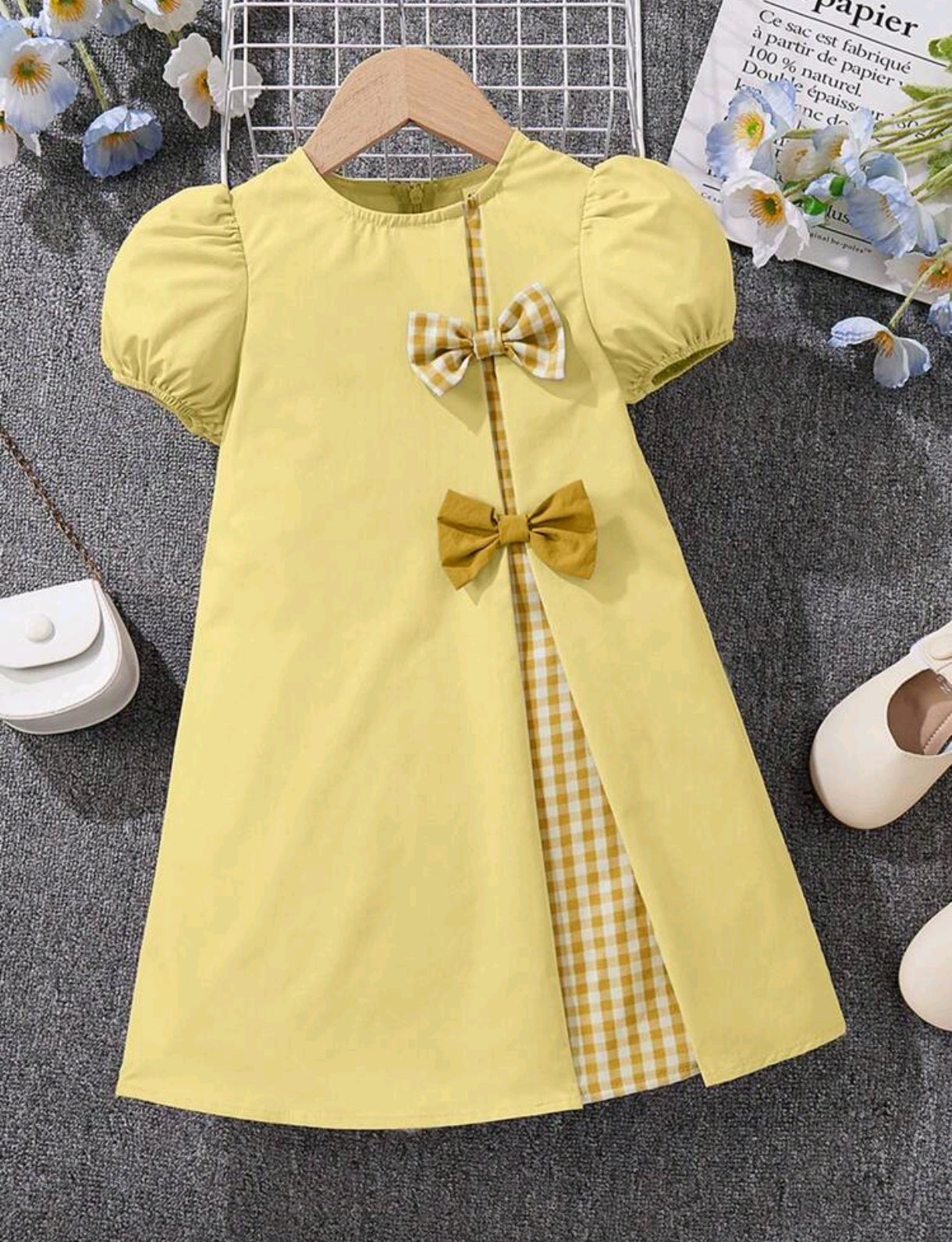 Vestido mangas de globo con detalles en moño