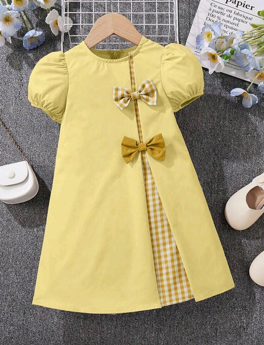 Vestido mangas de globo con detalles en moño