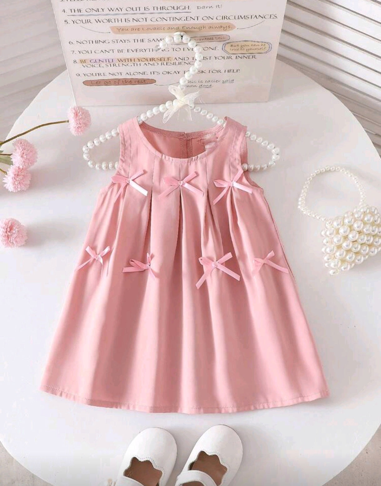 Vestido bebé sin mangas con detalles en moño