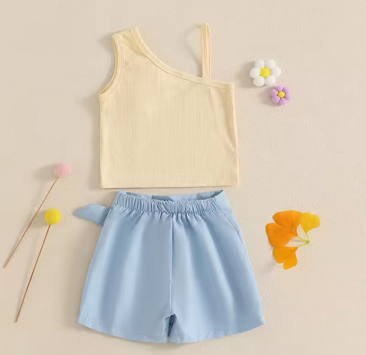 Blusa asimétrica+ short pollera