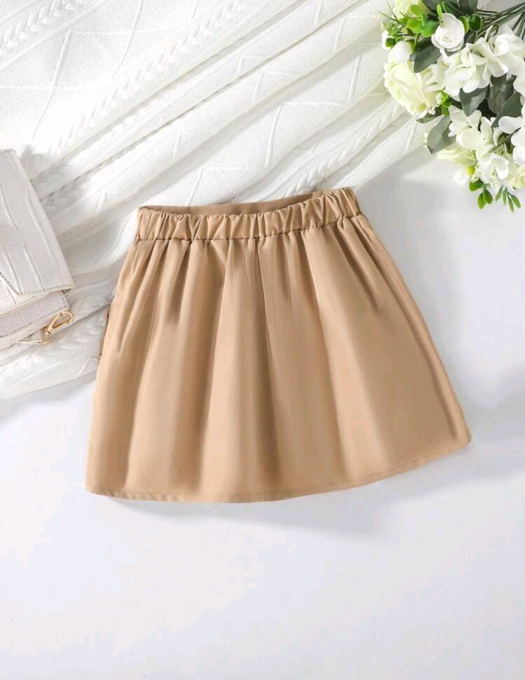 Falda con detalles en moño
