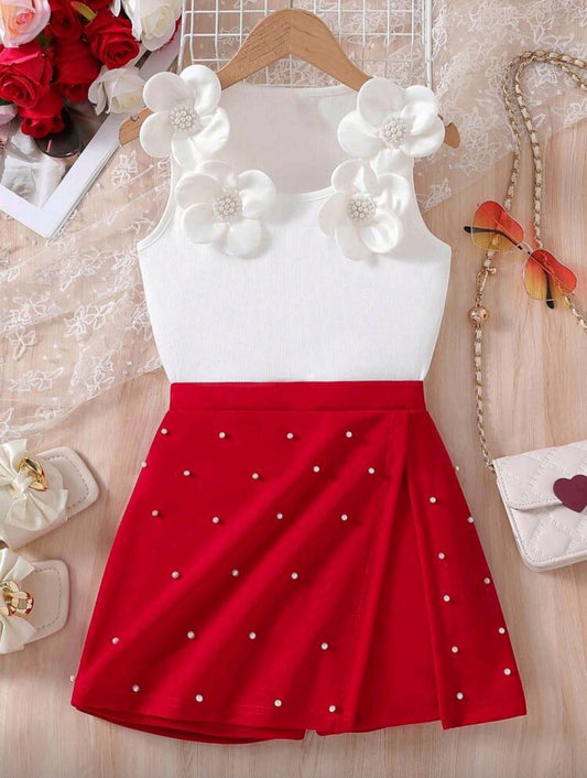 Blusa con flores 3D + short pollera con perlitas