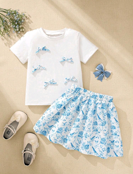 Blusa con detalles en moño + falda floral