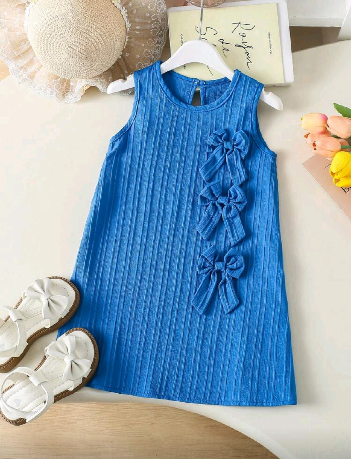 Vestido sin mangas con moños 3D