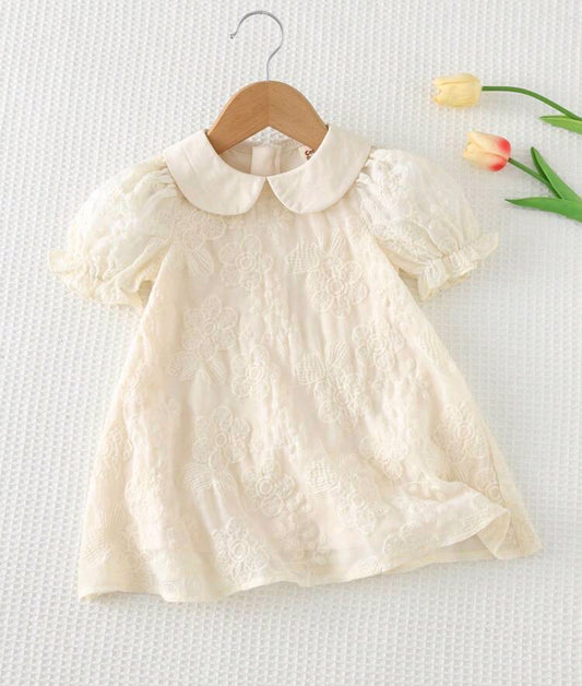 Vestido beige bebe con cuello y bordados