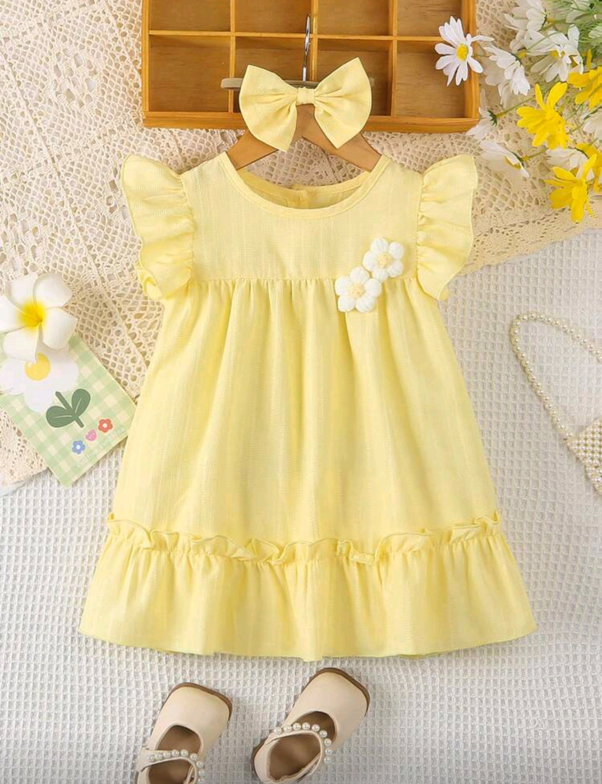 Vestido bebé con detelles en flor