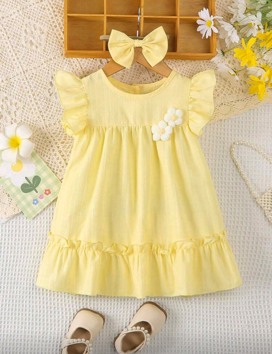 Vestido bebé con detelles en flor