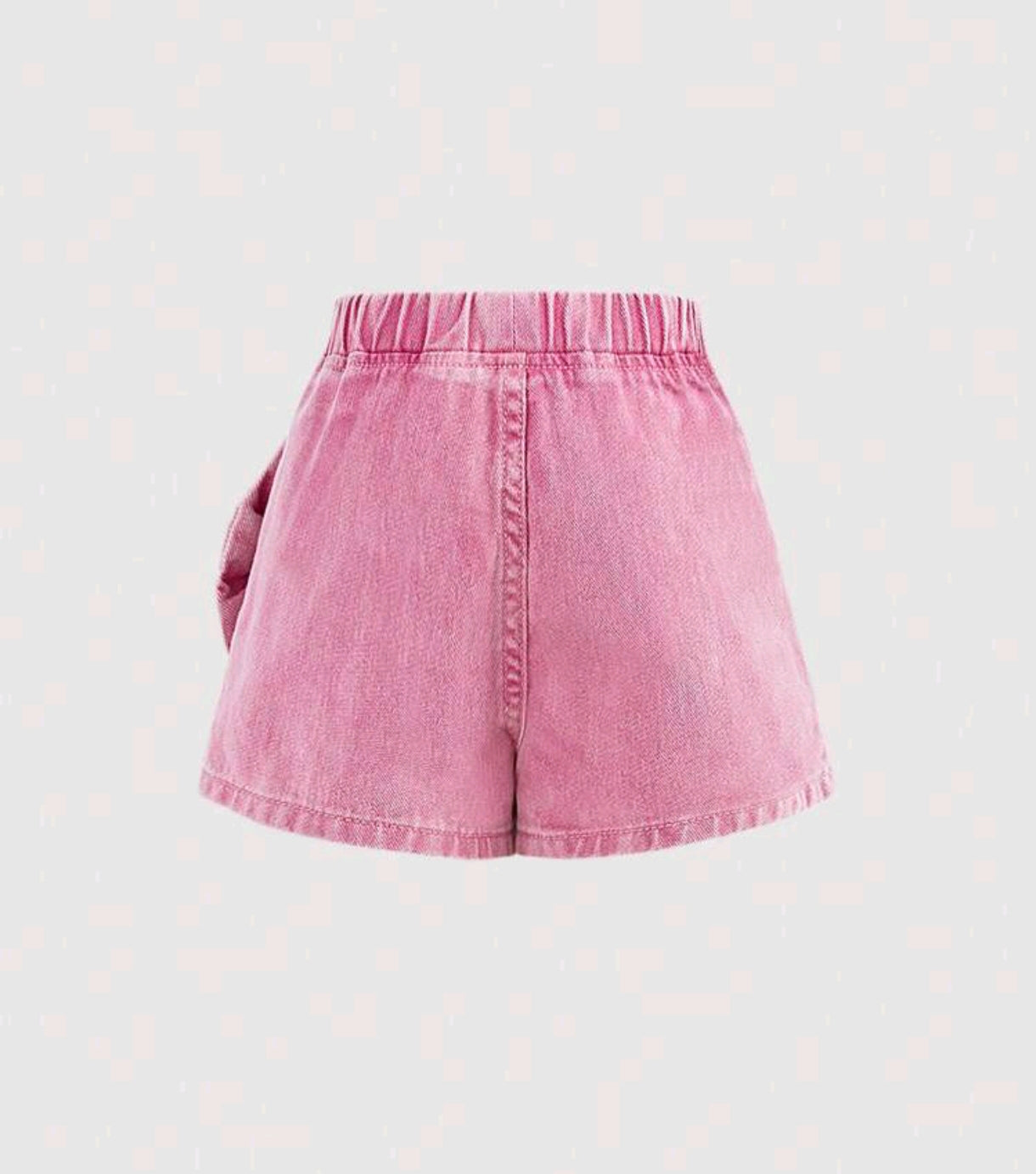 Short pollera de Jeans rosa, con moño lateral