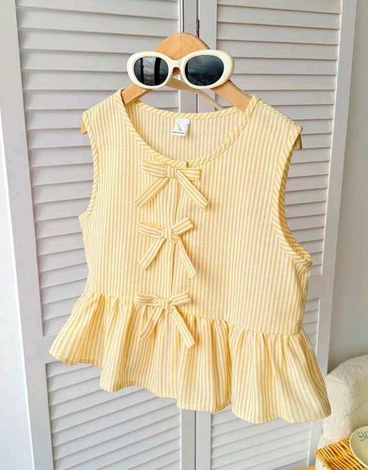 Blusa amarilla sin mangas a rayas con moños