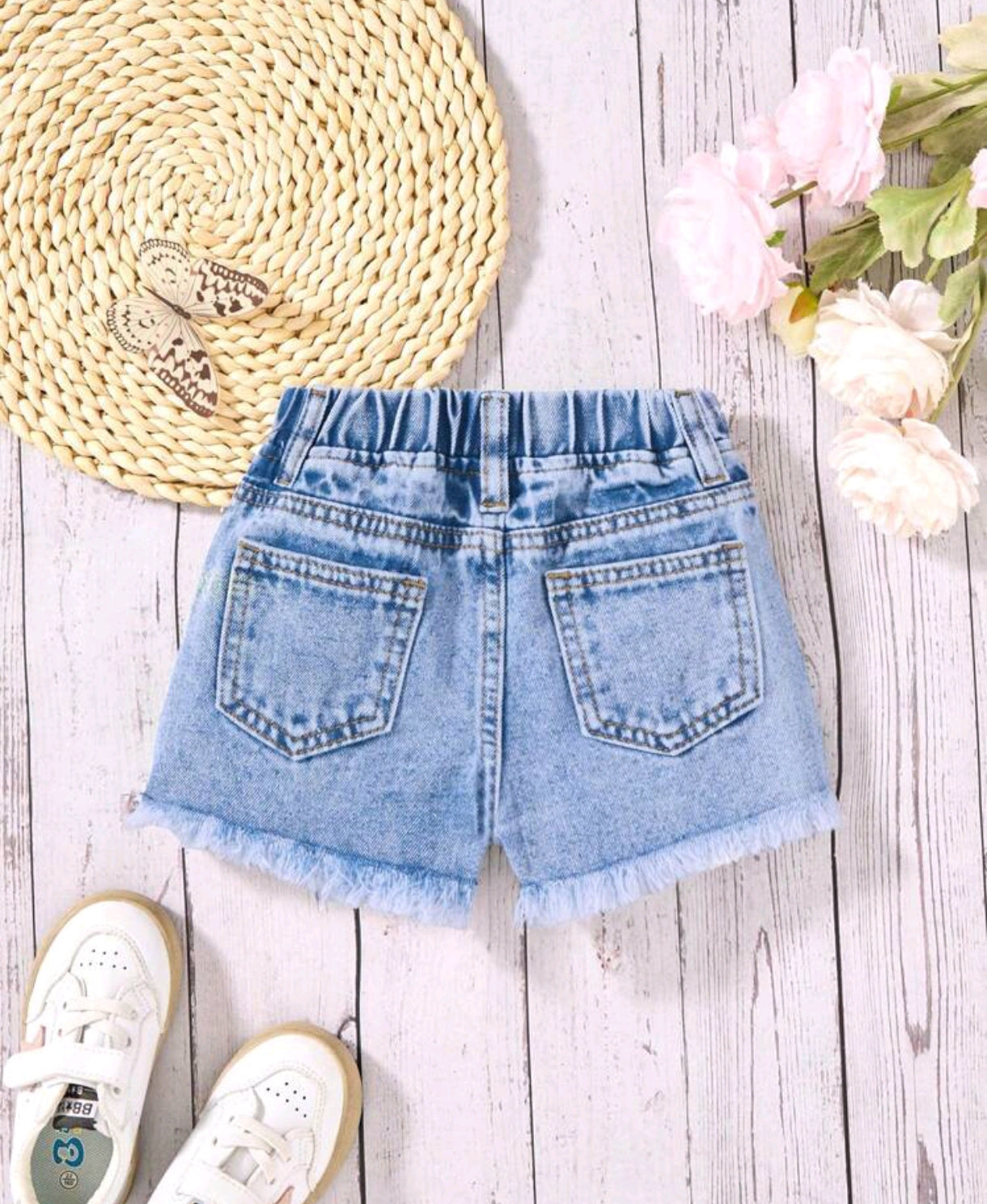 Short de jeans para bebé con moño