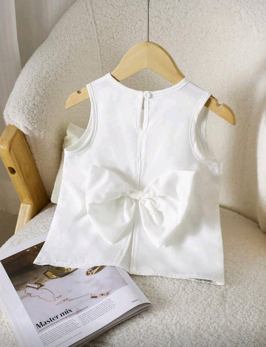 Blusa con moño en la espalda