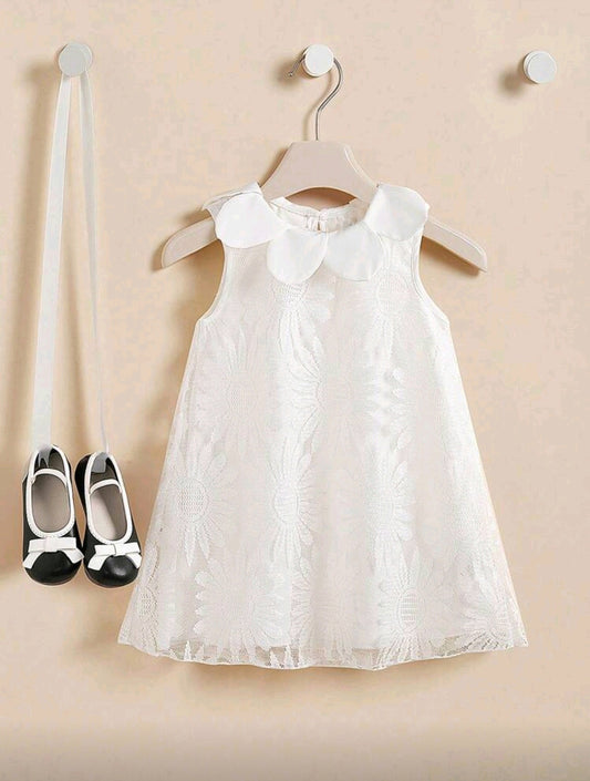 Vestido Blanco sin mangas con cuello