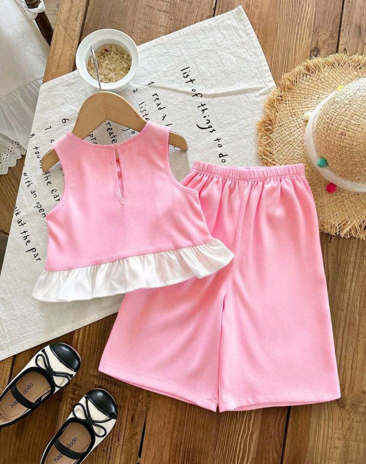 Blusa con detalles en moños + pantalón