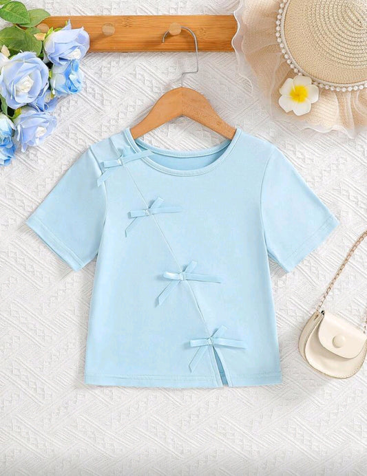 Remera con detalles en moños