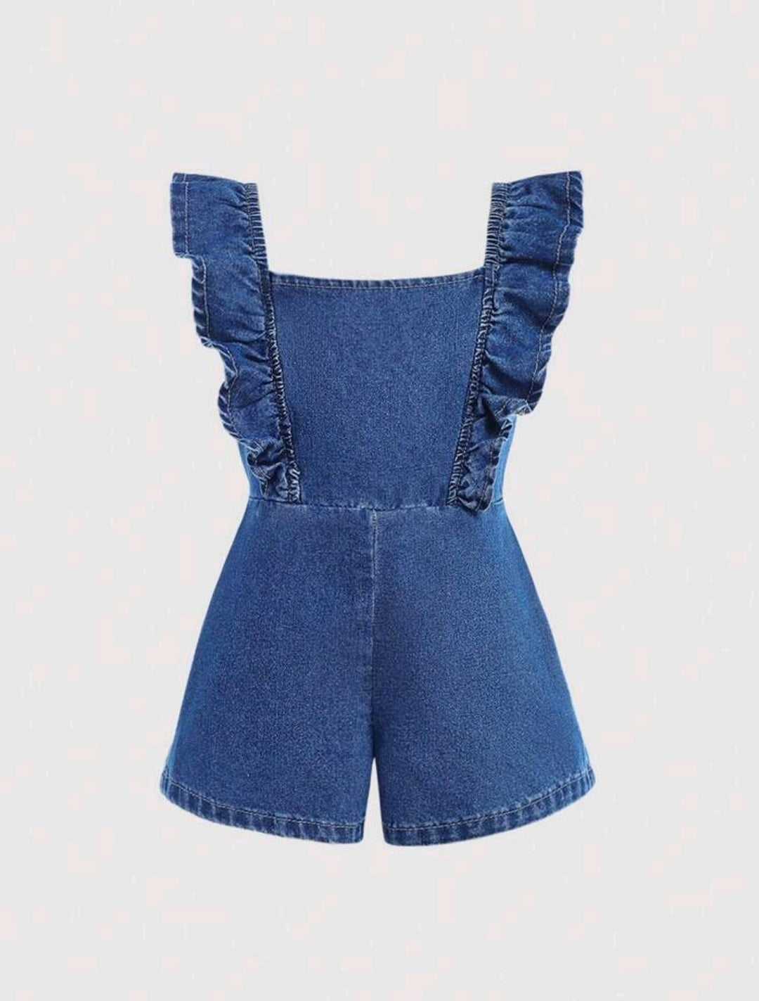 Jardinera de jeans con espalda abierta y detalles en moño