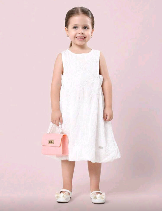 Vestido blanco tipo broderie con moño