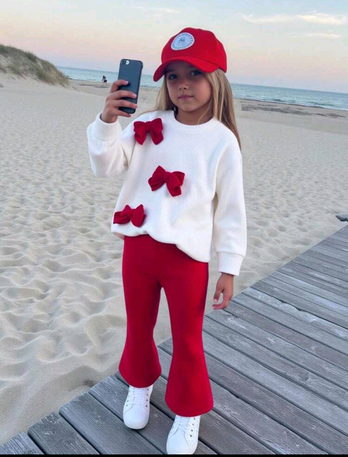 Mangas largas con detalles en moños + pantalón acampanado