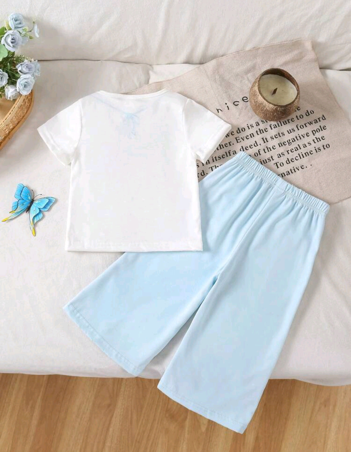 Blusa con detalle en moño+ pantalón ancho con moños