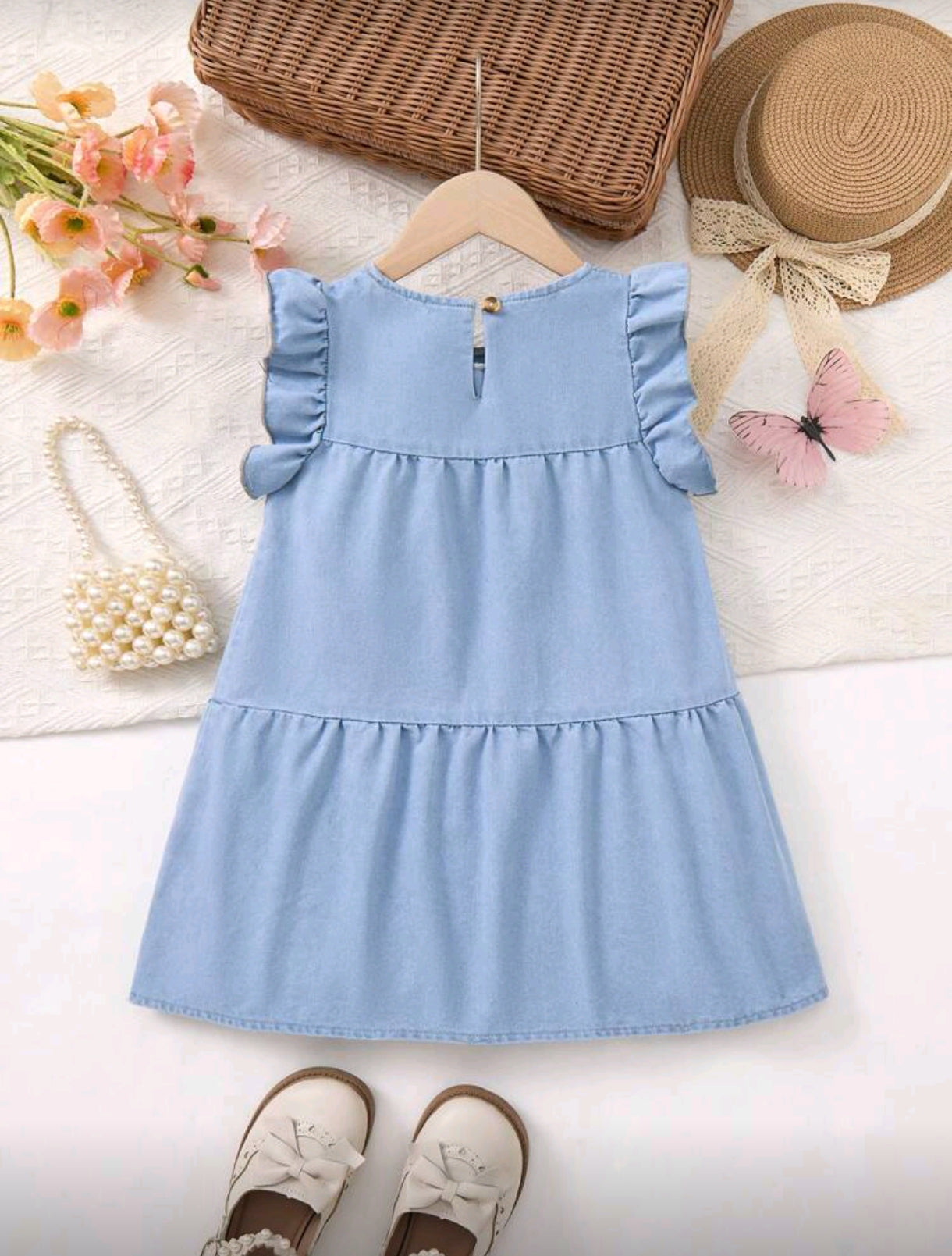 Vestido de jeans con detalles en moños
