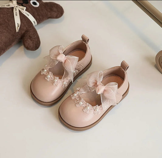 Acc. zapato con lazo y detalles en perlitas