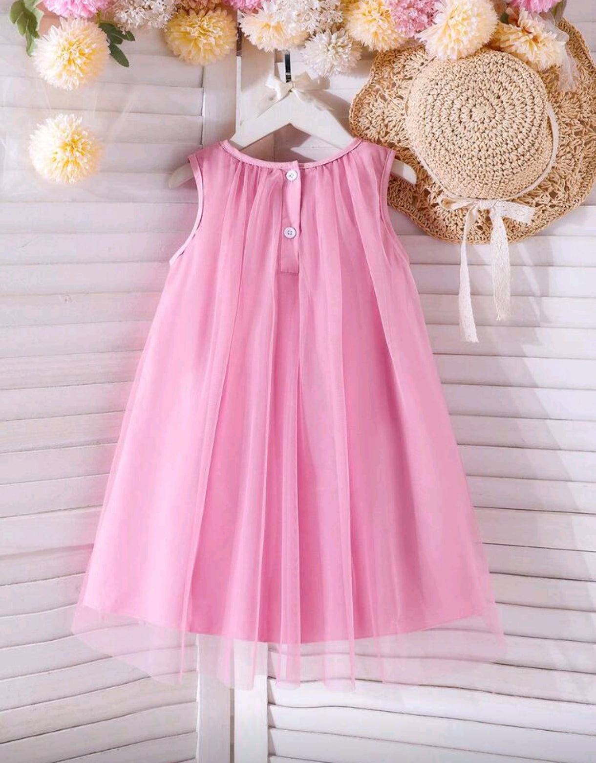 Vestido de tul con detalles en moñitos
