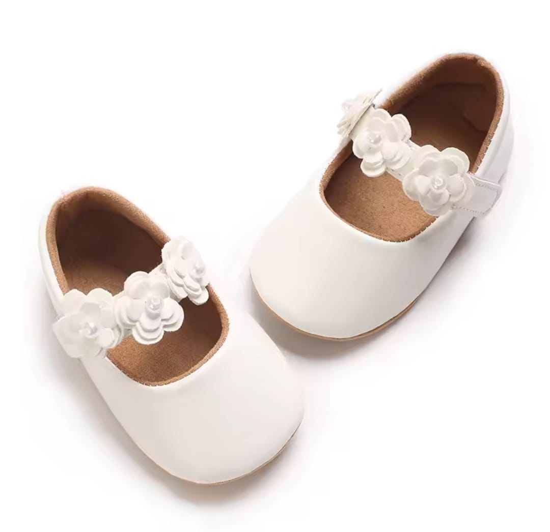 Acc. Zapatito con suela engomada con moños