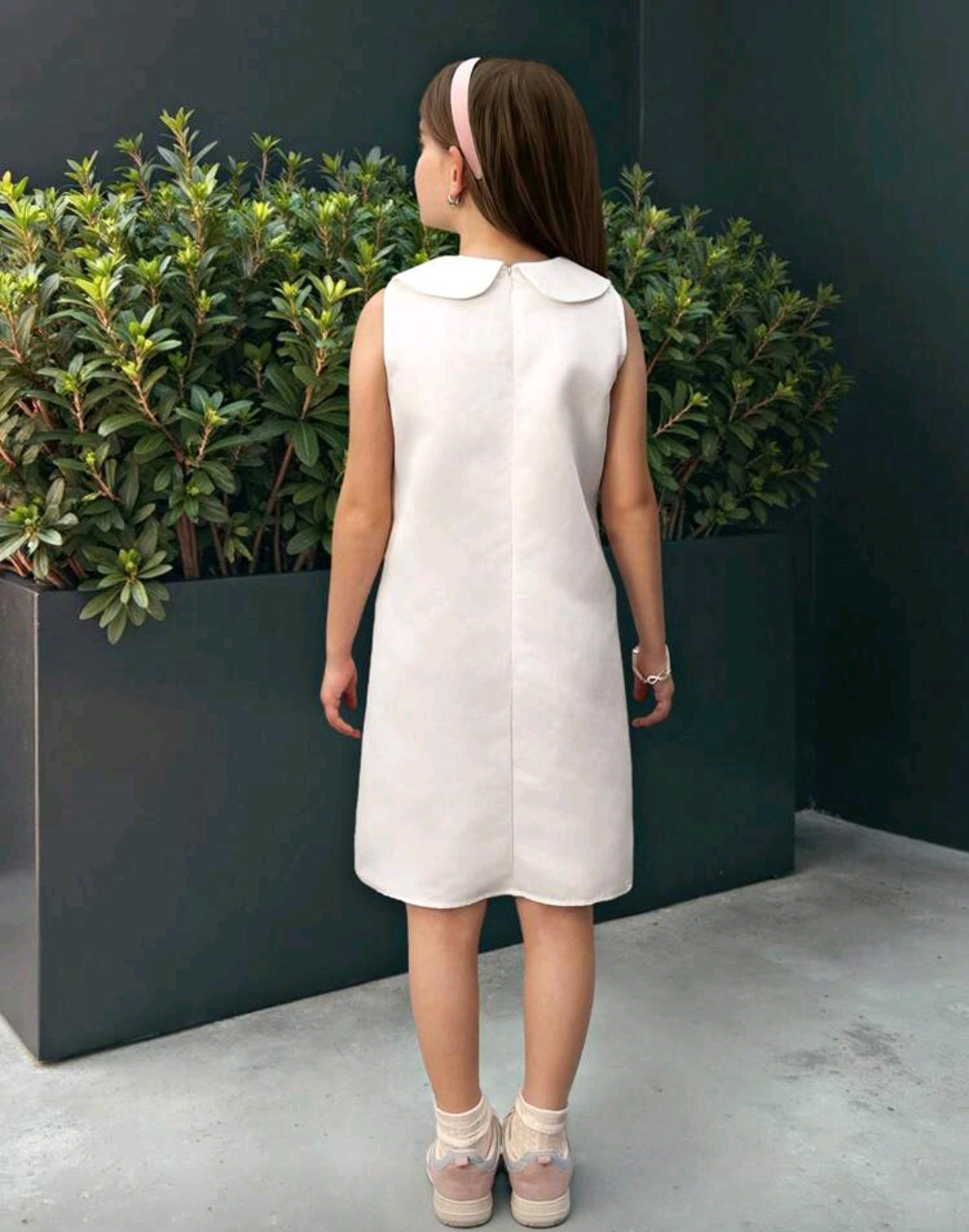 Vestido blanco con detalles en moños