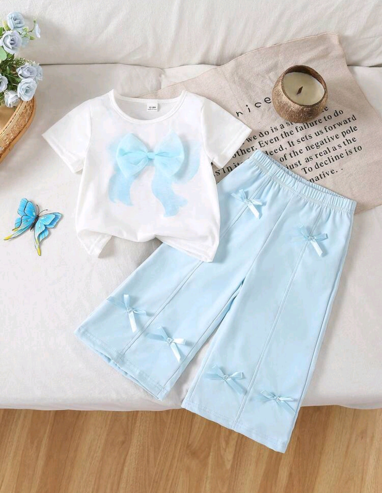 Blusa con detalle en moño+ pantalón ancho con moños