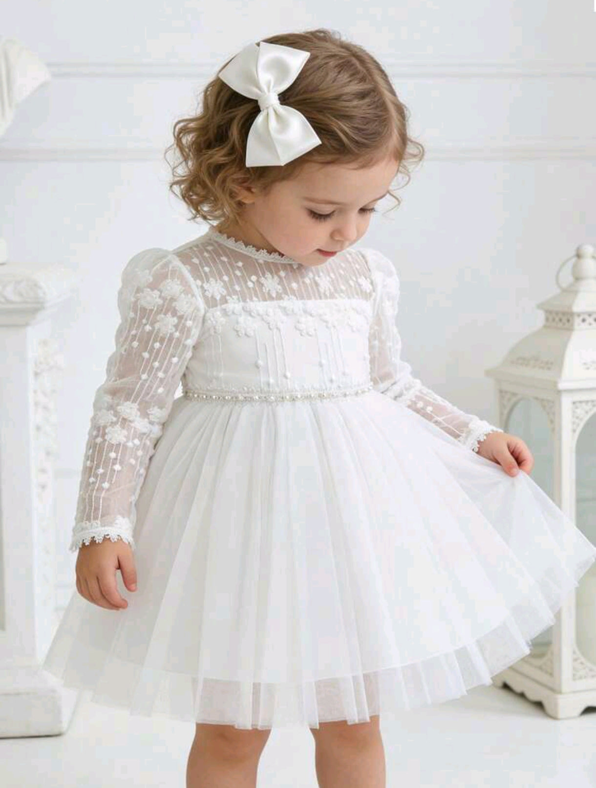 Vestido blanco de tul con mangas