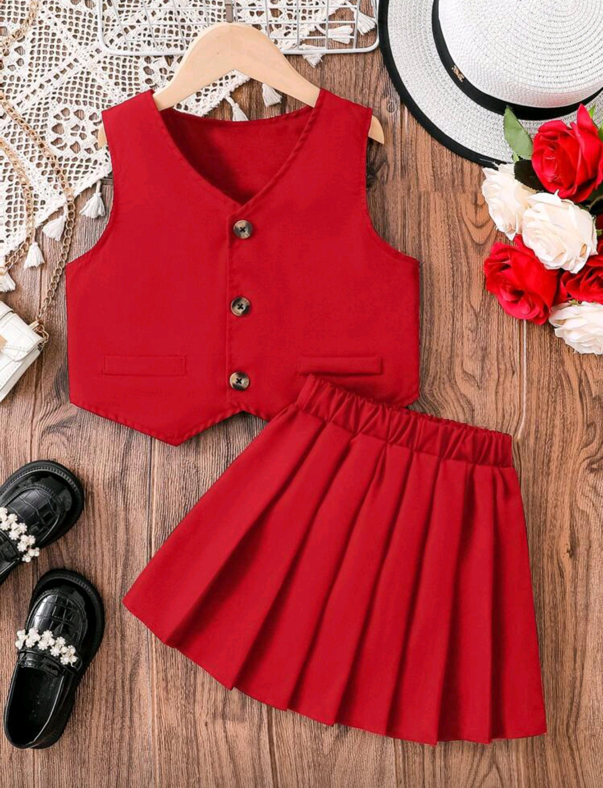 Chaleco+ falda plisada