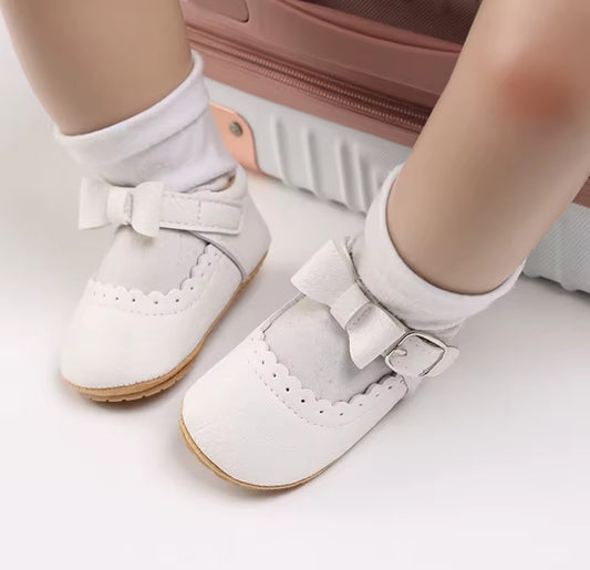 Acc. Zapato con moño suela engomada