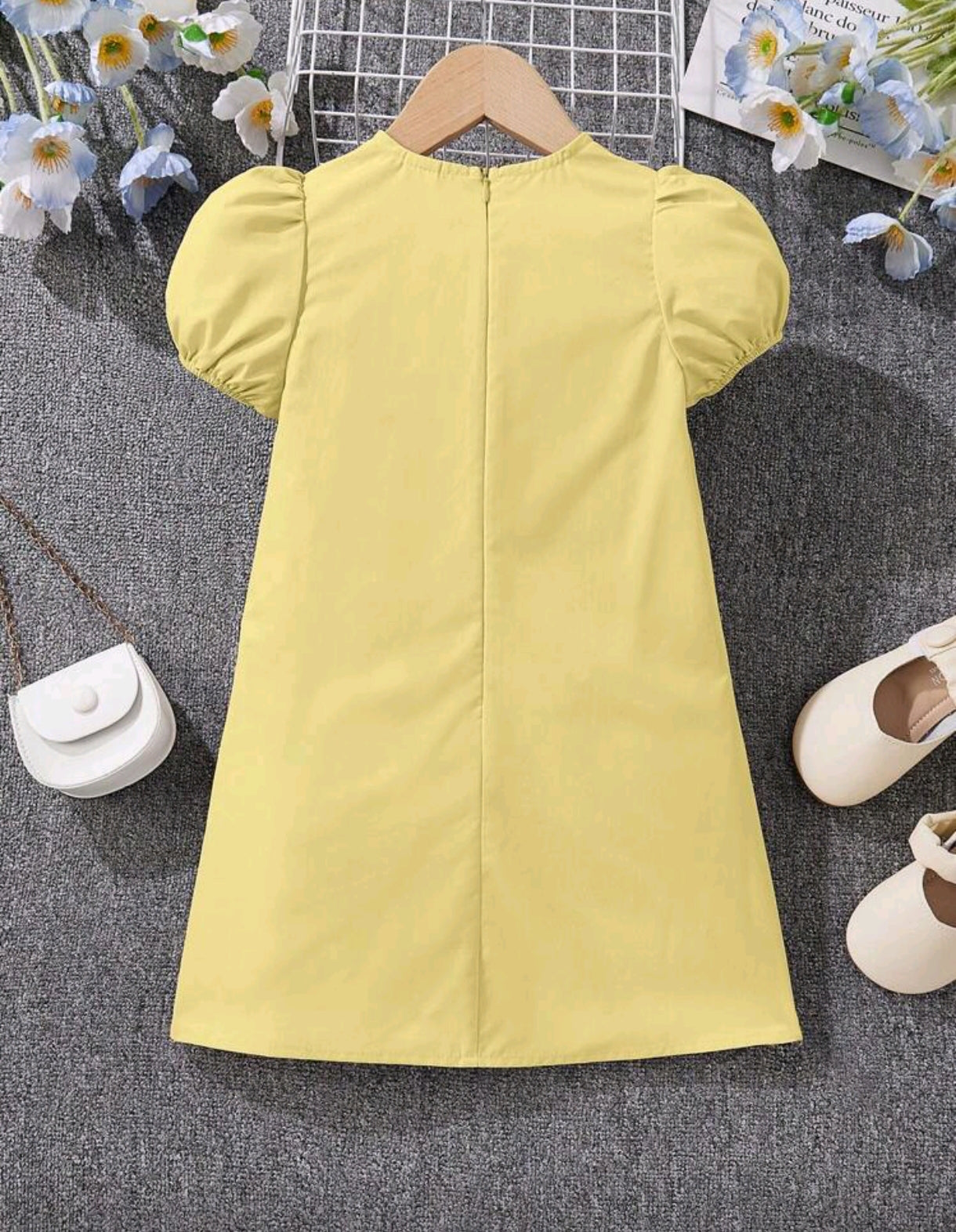 Vestido mangas de globo con detalles en moño