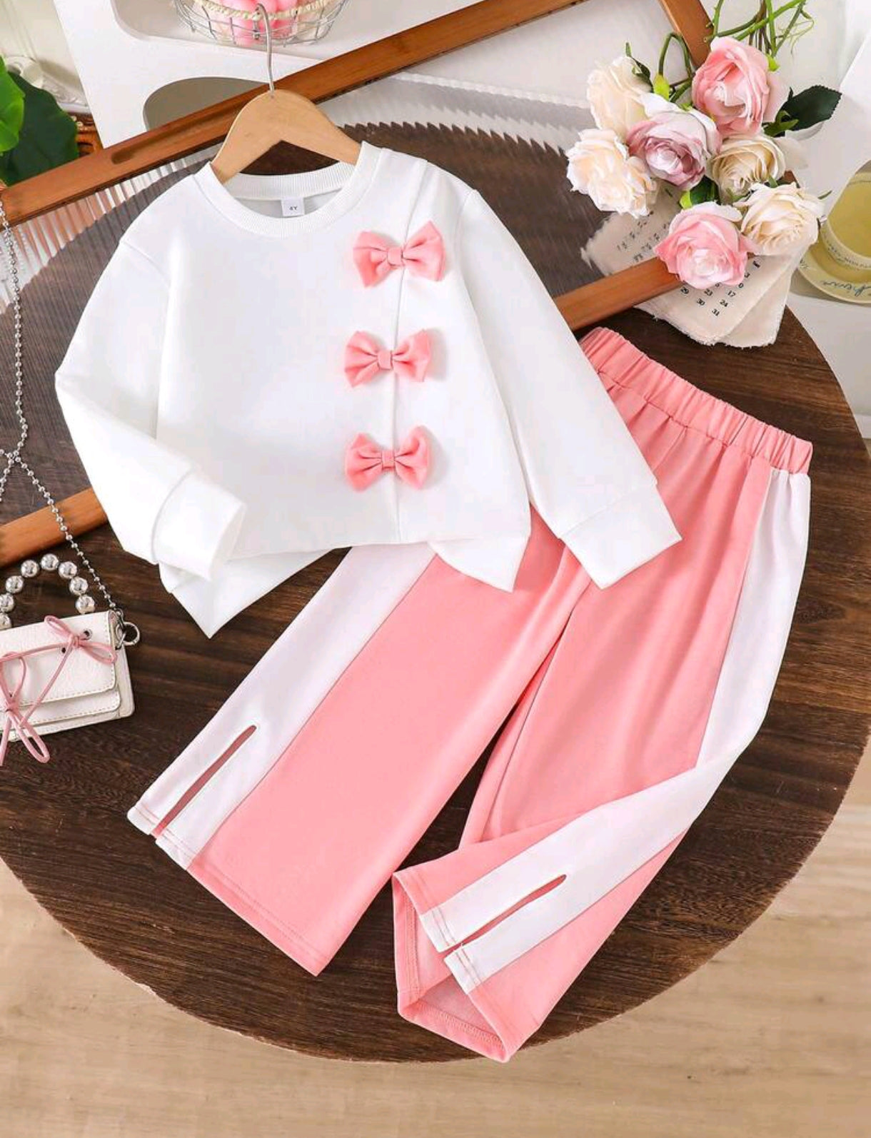 Mangas largas con moños+ pantalón con rayas