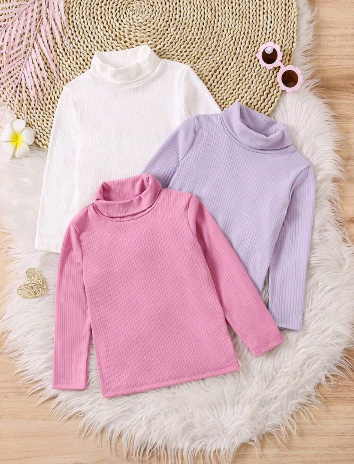 Mangas largas acanaladas, cuello alto