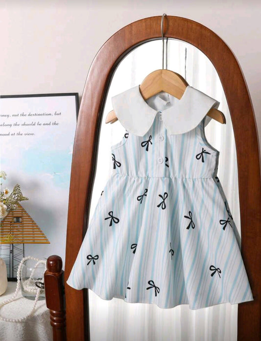 Vestido bebe sin manga, con detelles de moños