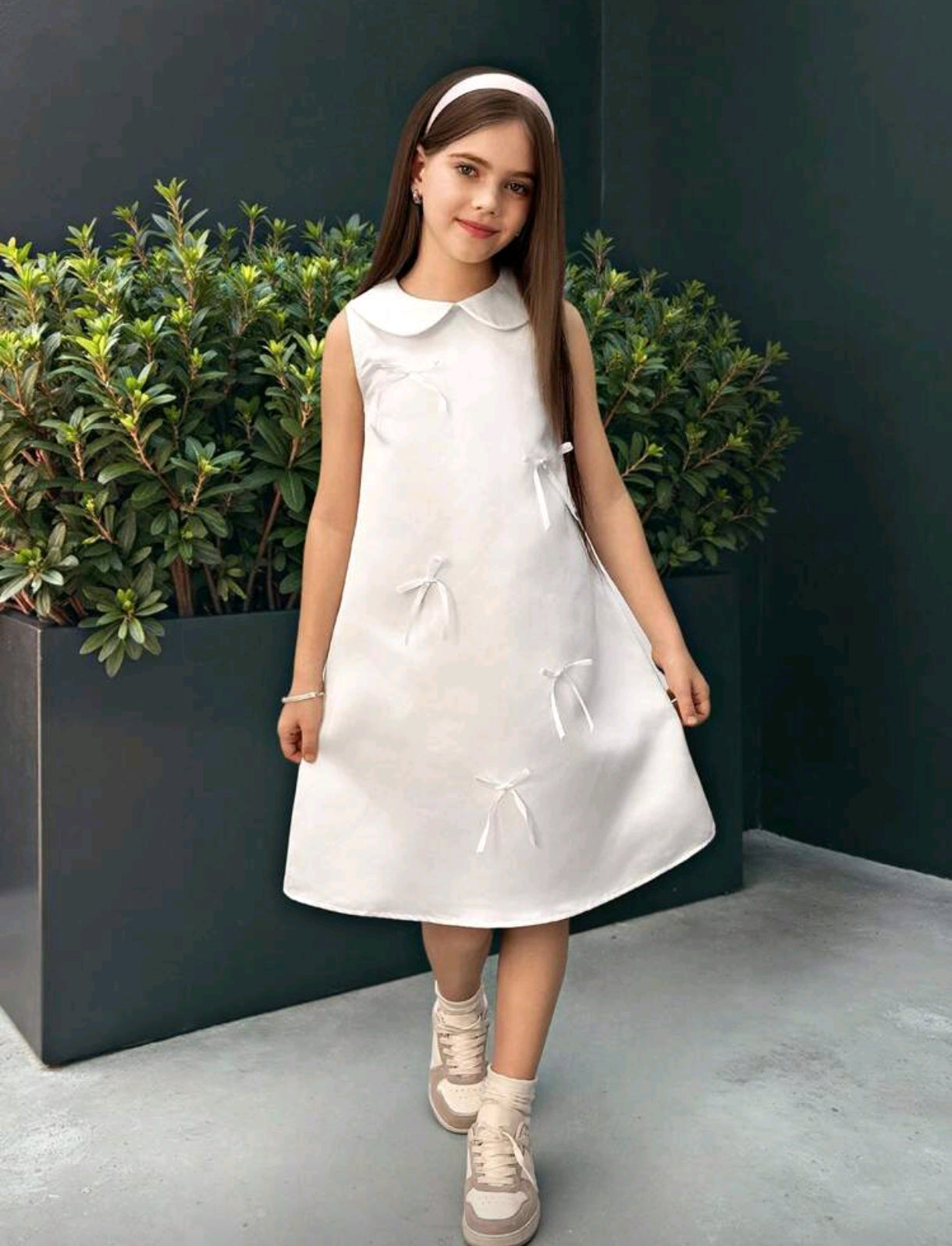 Vestido blanco con detalles en moños