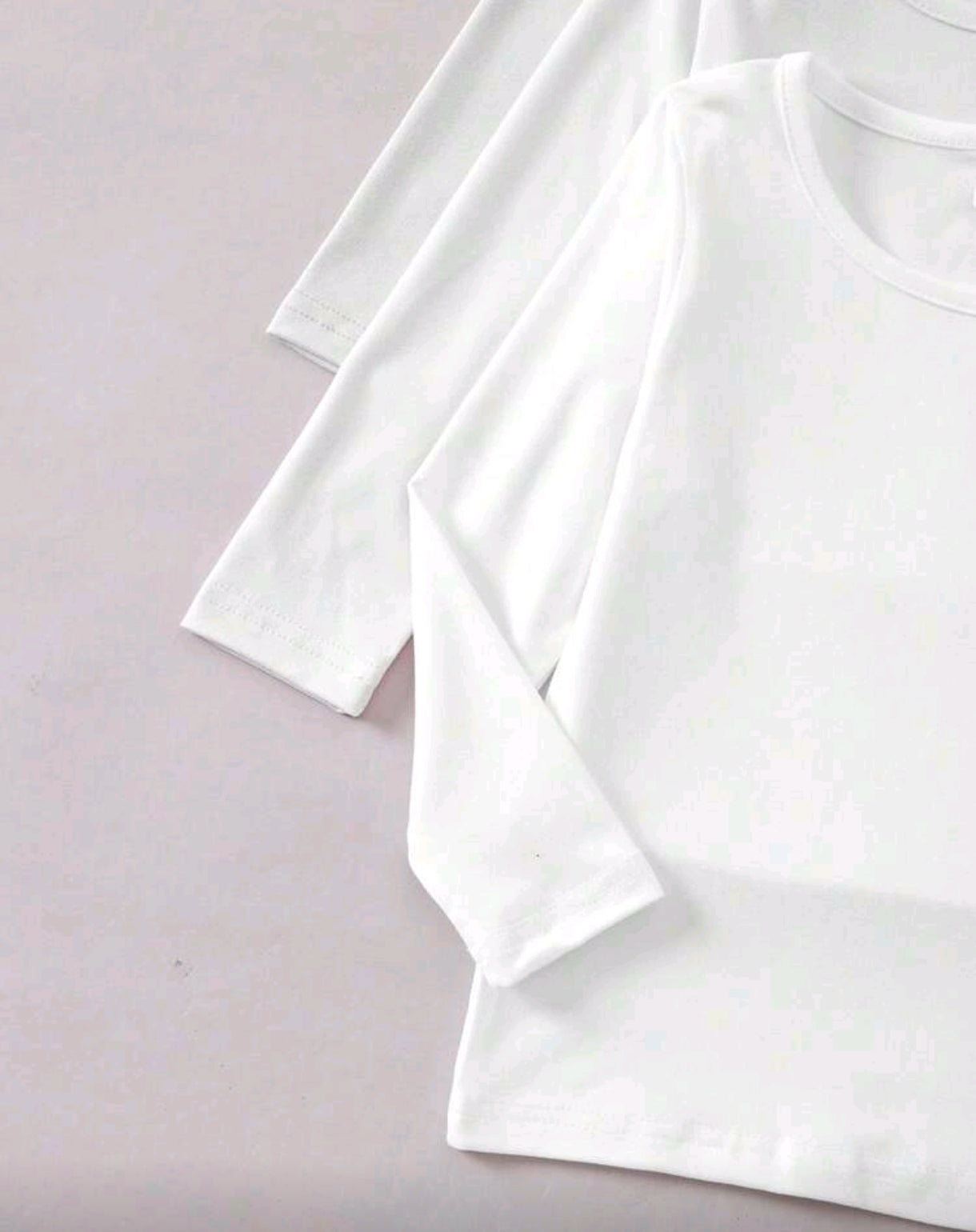 Mangas largas Blancas lisas cuello redondo